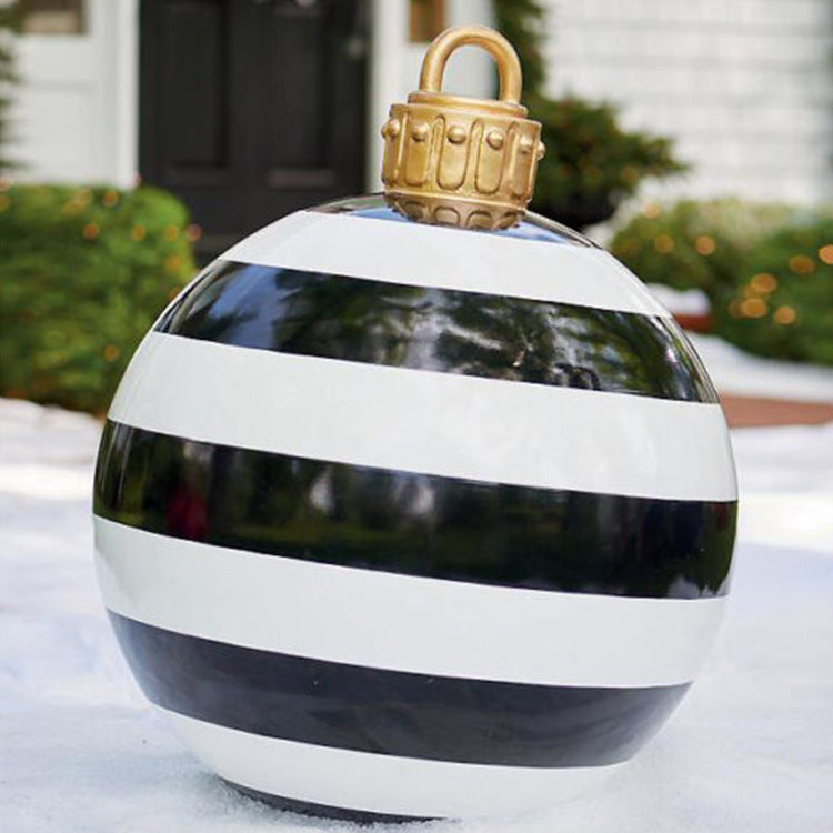 Giant inflatable Christmas bauble in garden