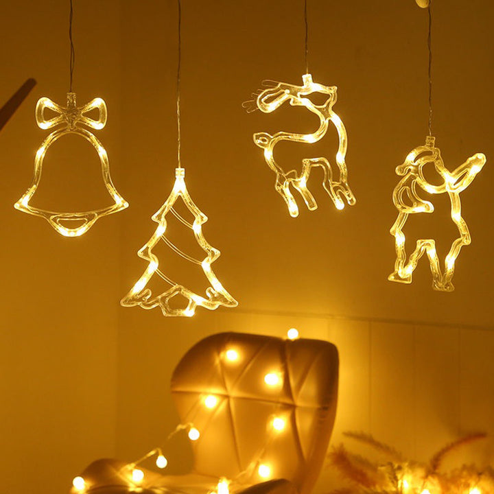 Glowing Santa window light on glass