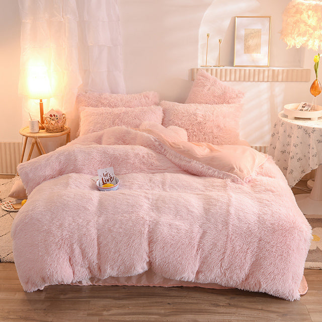 Fluffy plush bedding set on a double bed