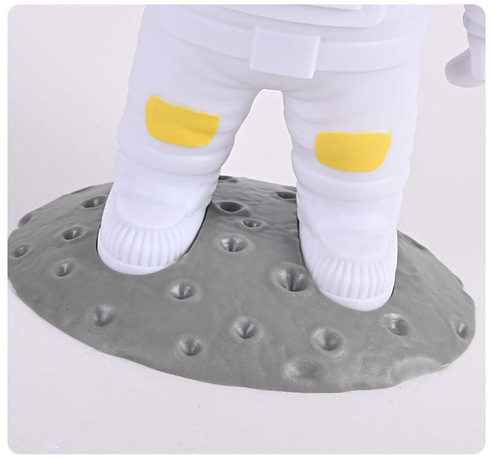 Astronaut star projector on a shelf