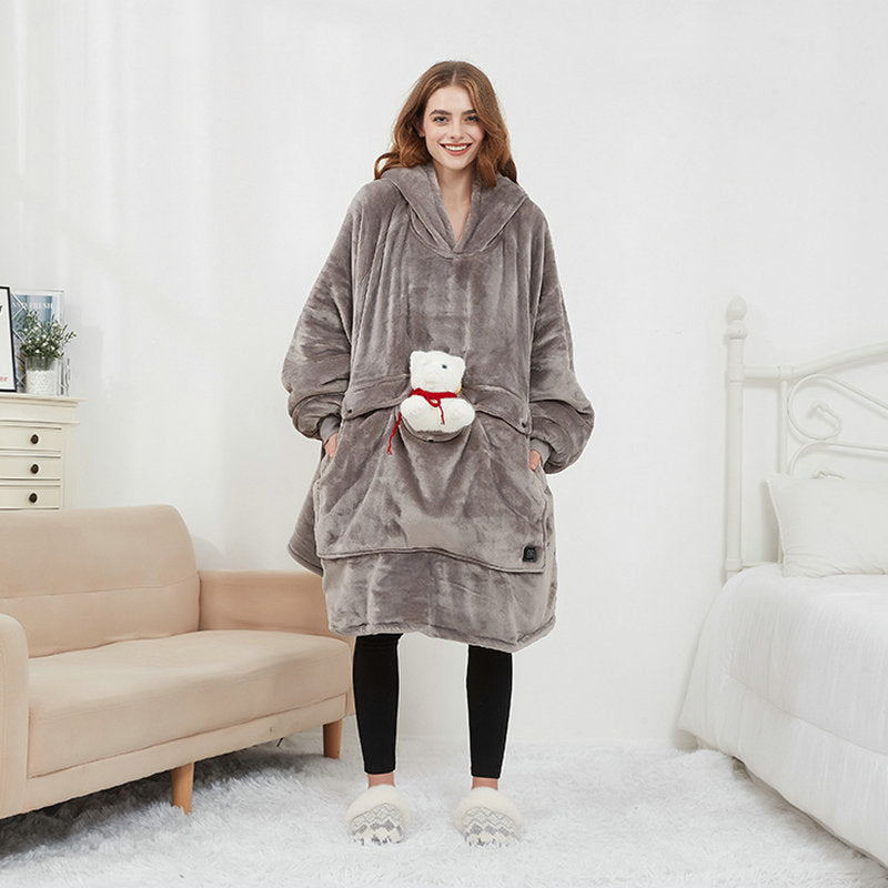 Person in a heated hoodie blanket