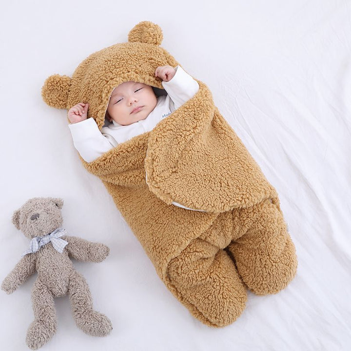 Baby in a teddy fleece sleeping bag