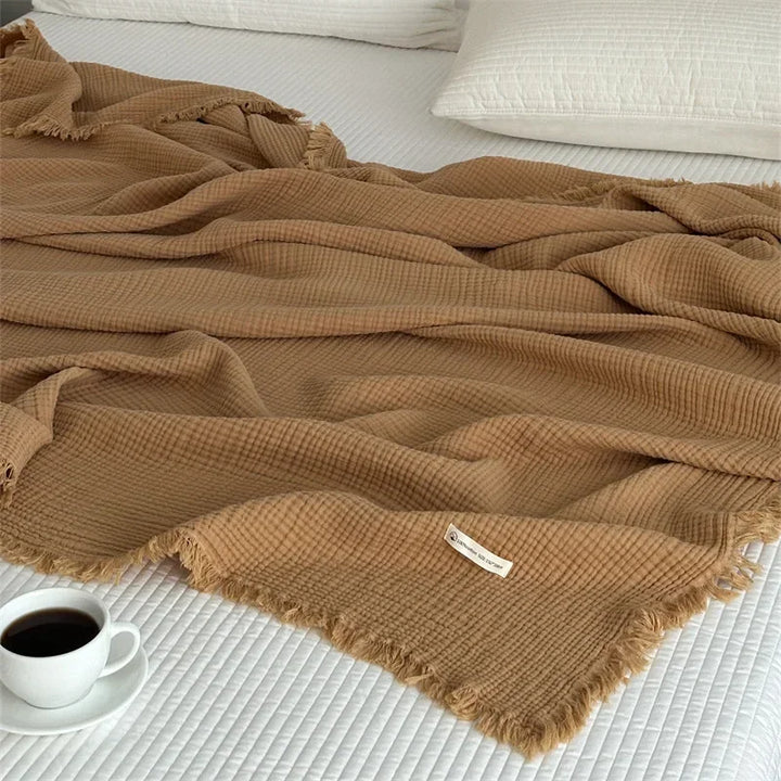Solid colour cotton sofa blanket