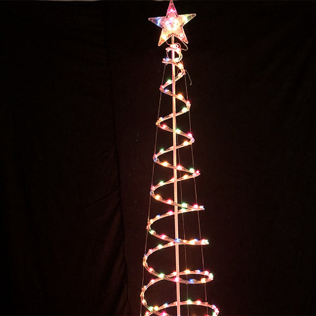 Glowing spiral Christmas tree light outdoors