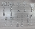 Clear acrylic icicle ornaments hanging on Christmas tree