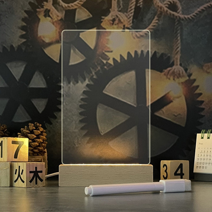 Glowing acrylic message board on wooden base